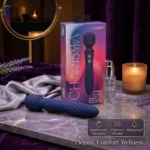 Charisma Mystique Blue massager with a rounded handle end, shown beside its packaging.