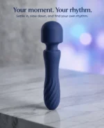 Charisma Mystique Blue massager on marble with the headline Your moment. Your rhythm.