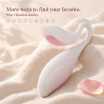 White and blush pink Coco Seed vibrator on ivory linen with nine vibration modes shown above
