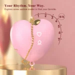 Blush-pink Cupid's Heart suction stimulator with a gold-tone chain and a diagram of seven suction modes.