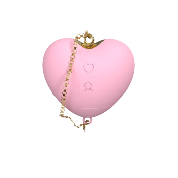 Cupid's Heart suction stimulator in blush pink with gold-tone chain detailing.